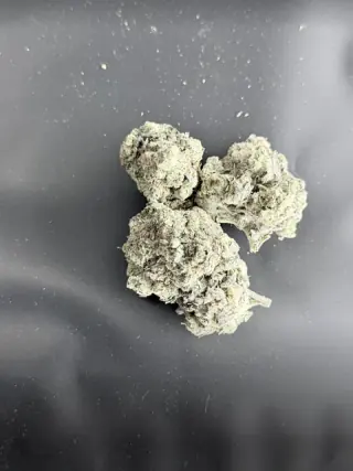 Flor Head Punch sobre fondo SmokeKings